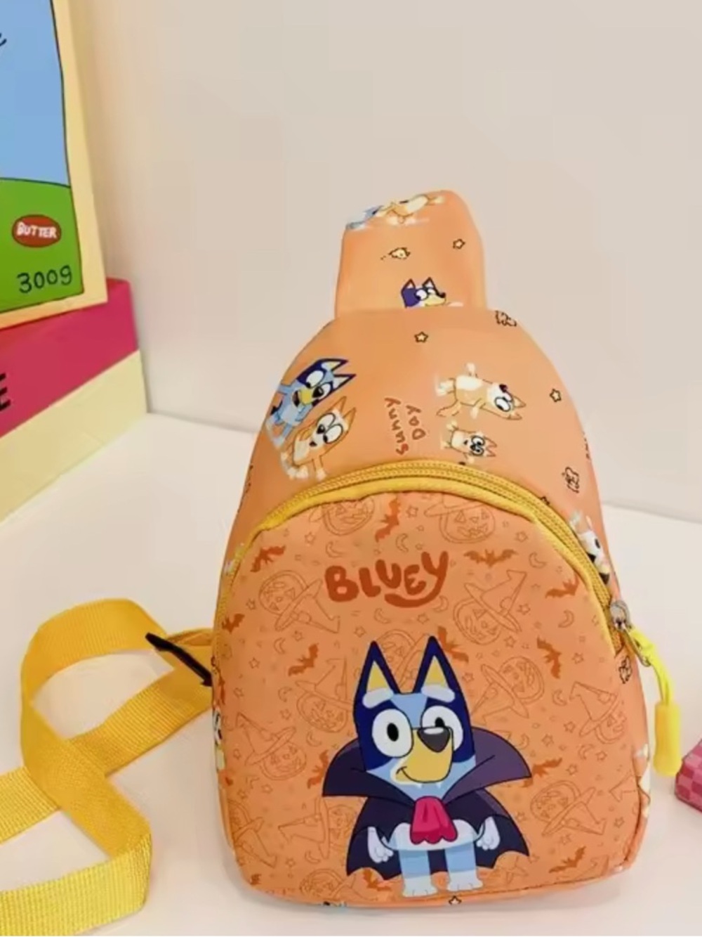 Bluey Orange Kids Sling Bag with Yellow Strap